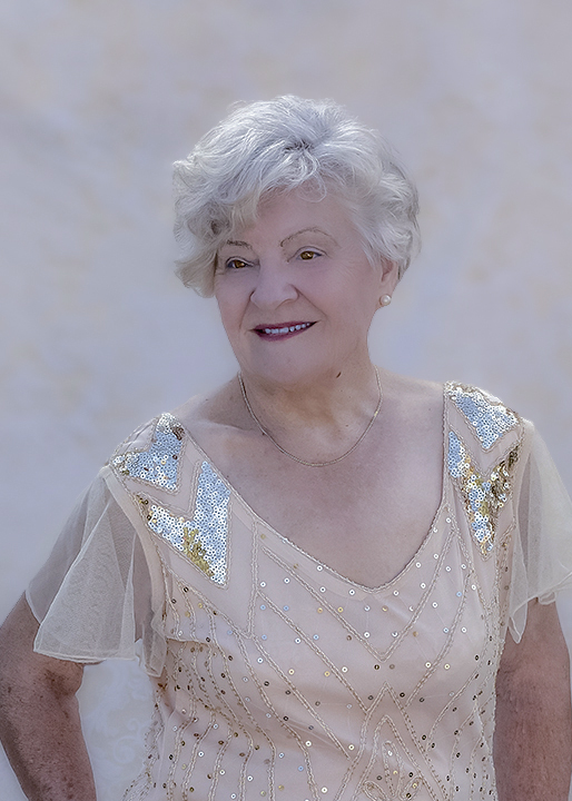 Senior woman in vintage gown fashion headshot